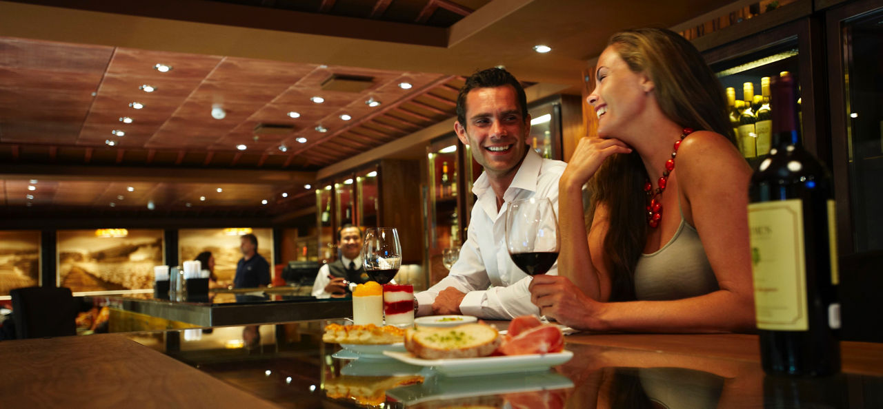 vintages bar couple laughing wine appetizer 2